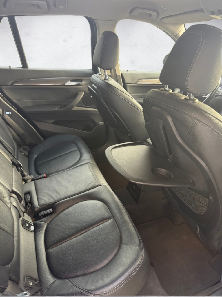 BMW X1 noire élégante avec intérieur cuir – Cullinan Automotive