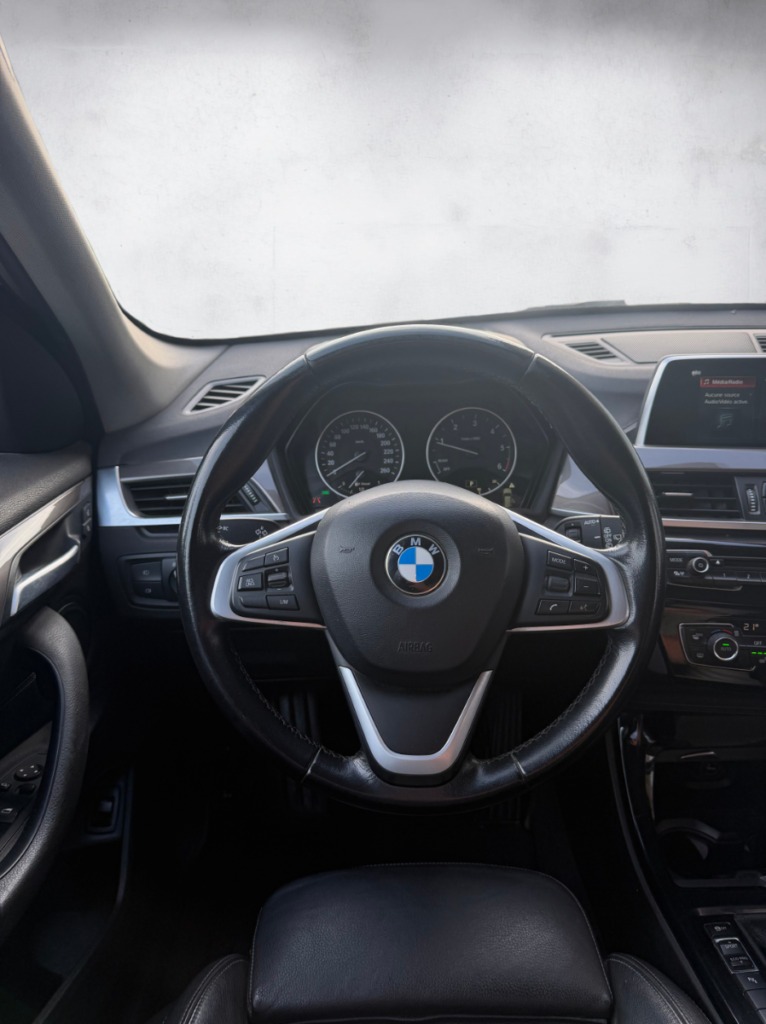 BMW X1 noire élégante avec intérieur cuir – Cullinan Automotive